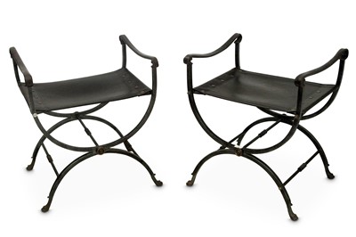 Lot 772 - A pair of leather upholstered iron savonarola...