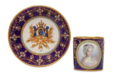 Lot 26 - A SÈVRES STYLE 'JEWELLED' CABINET CUP AND...