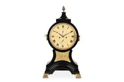Lot 93 - A FINE GEORGE III BALLOON SHAPED EBONISED...