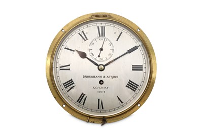 Lot 70 - A 19TH CENTURY BRASS BULKHEAD CLOCK...