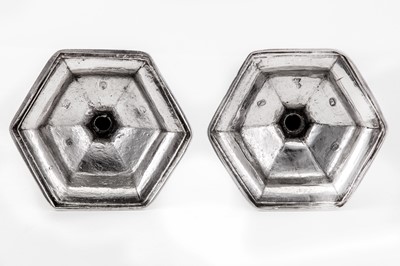 Lot 3 - A matched pair of George I / George II Britannia standard and sterling silver candlesticks, London 1715 by Richard Greene (reg. 15th April 1703) and London 1731 by James Gould (reg. 19th Nov 1722)