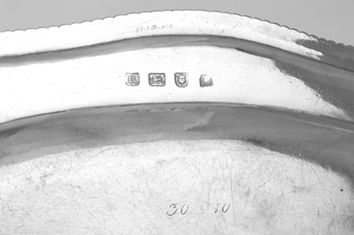 Lot 17 - Earl of Egremont - A pair of George III sterling silver meat or poultry dishes, London 1772 by John Parker and Edward Wakelin (active 1759-1777)