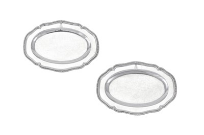 Lot 17 - Earl of Egremont - A pair of George III sterling silver meat or poultry dishes, London 1772 by John Parker and Edward Wakelin (active 1759-1777)