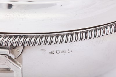 Lot 10 - A pair of George III sterling silver covered vegetable or entrée dishes, London 1805 by William Burwash and Richard Sibley I (reg. 7th Oct 1805)