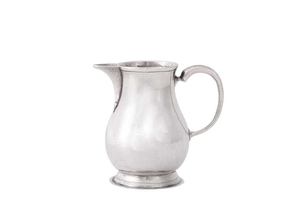 Lot 6 - A George I sterling silver cream jug, London 1726 by John Gorsuch (reg. 6th April 1726)