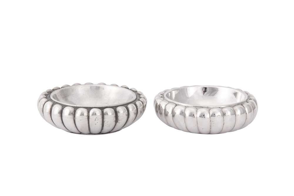 Lot 16 - An interesting matched pair of George III sterling silver trencher salts