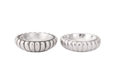 Lot 16 - An interesting matched pair of George III sterling silver trencher salts