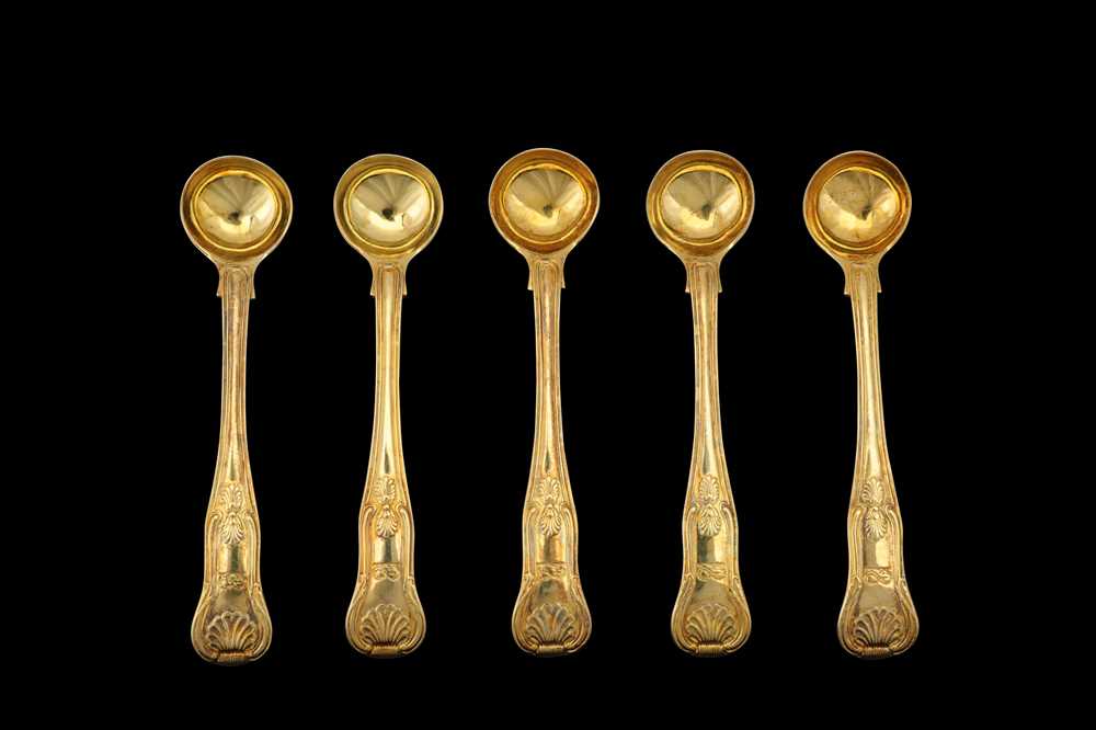 Lot 56 - A set of five George III sterling silver gilt salt spoons, London 1819 by William Chawner