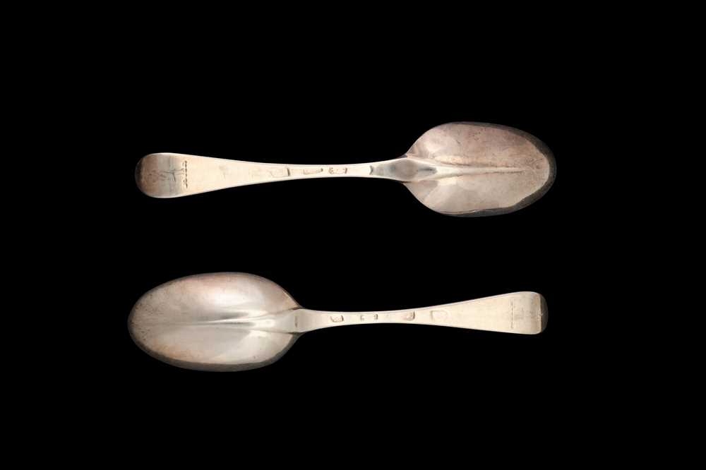 Lot 42 - A pair of George I Britannia standard silver dessert spoons, London 1718 by Paul Hanet (first reg. 7th March 1716)