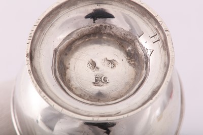 Lot 85 - A George II silver ‘duty dodger’ pepper caster, London circa 1730 by Elizabeth Goodwin (reg. 2nd Dec 1729)