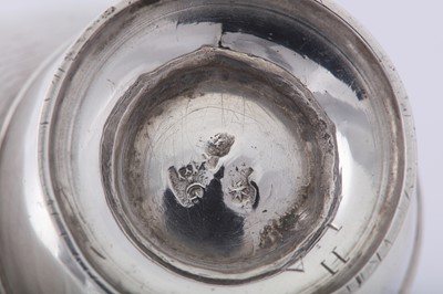 Lot 85 - A George II silver ‘duty dodger’ pepper caster, London circa 1730 by Elizabeth Goodwin (reg. 2nd Dec 1729)