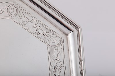 Lot 11 - A George III sterling silver teapot stand, London 1787 by John Wakelin and William Taylor (reg. 25th Sep 1776)
