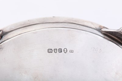 Lot 97 - A George III sterling silver teapot stand, London 1790 by James Young (first reg. 21st July 1760)
