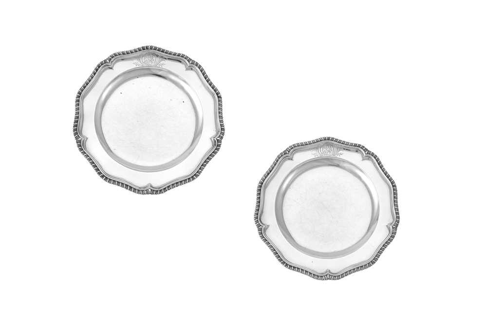 Lot 14 - A pair of George II sterling silver dinner plates, London 1758 by Edward Wakelin (reg. 17th Nov 1747)
