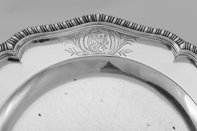Lot 14 - A pair of George II sterling silver dinner plates, London 1758 by Edward Wakelin (reg. 17th Nov 1747)