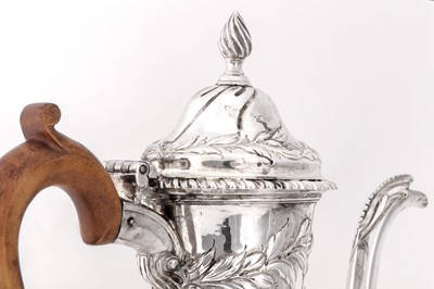Lot 96 - A large George III sterling silver coffee pot, London 1767 by David Whyte and William Holmes