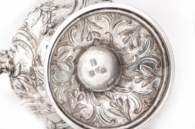 Lot 96 - A large George III sterling silver coffee pot, London 1767 by David Whyte and William Holmes