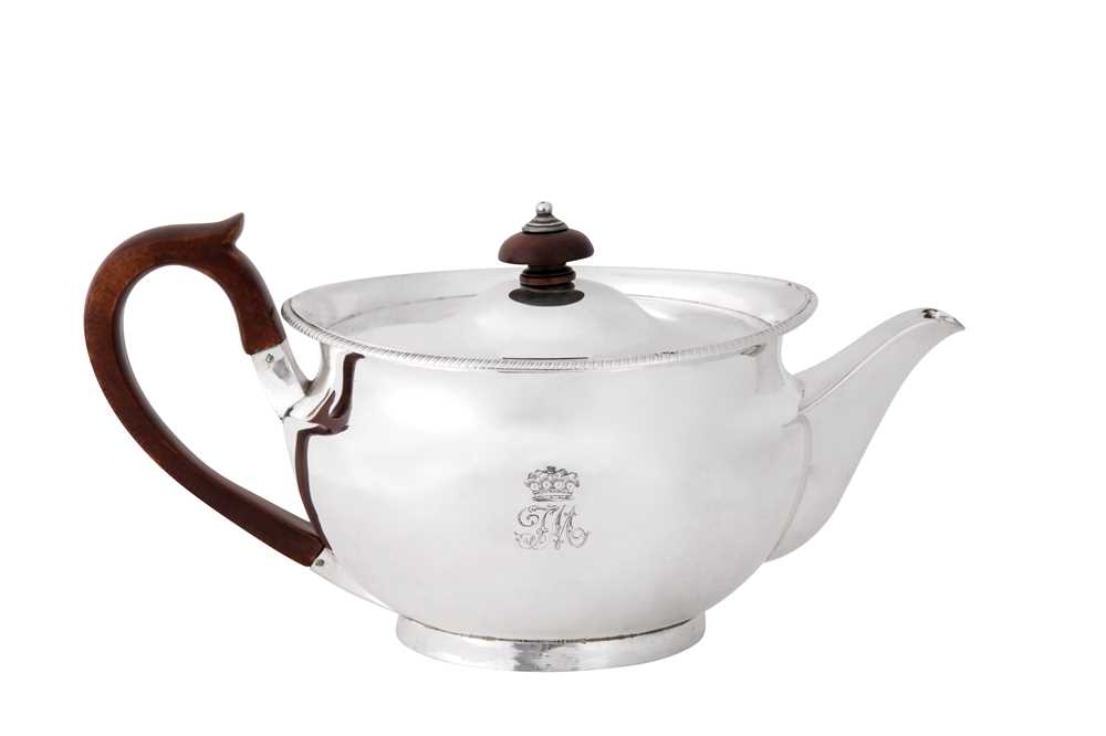 Lot 19 - A George III sterling silver teapot, London 1806 by Robert Garrard I (reg. 11th Aug 1802)
