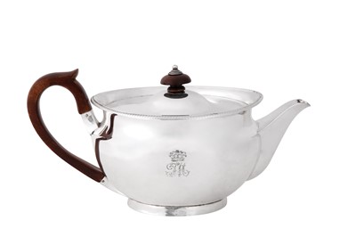 Lot 19 - A George III sterling silver teapot, London 1806 by Robert Garrard I (reg. 11th Aug 1802)
