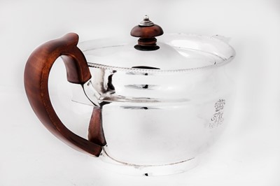 Lot 19 - A George III sterling silver teapot, London 1806 by Robert Garrard I (reg. 11th Aug 1802)