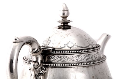 Lot 21 - A Victorian sterling silver teapot, London 1869 by Robert Garrard II (reg. 16th April 1818)