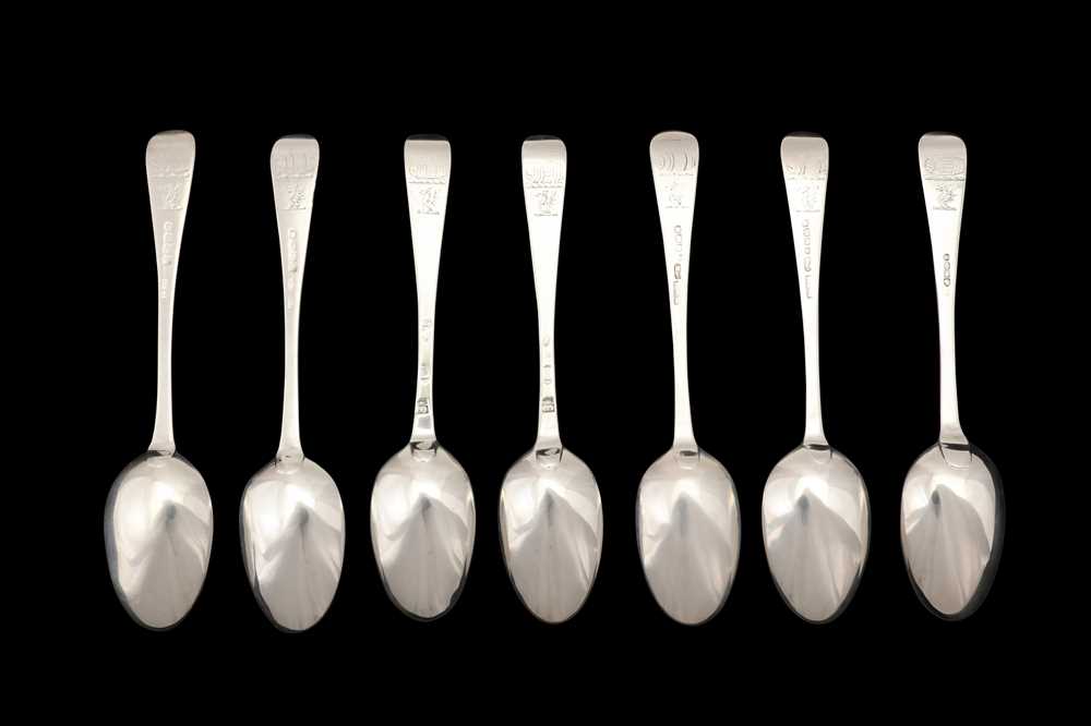 Lot 57 - A matched group of seven George II - Victorian Irish sterling silver dessert spoons