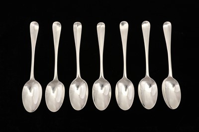 Lot 57 - A matched group of seven George II - Victorian Irish sterling silver dessert spoons