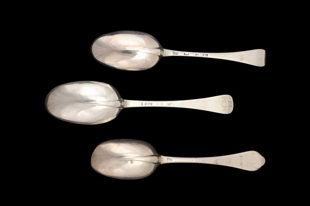 Lot 44 - A group of three Queen Anne – George I Britannia standard silver tablespoons