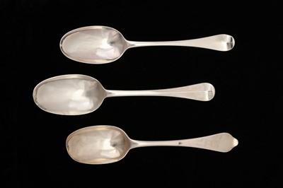 Lot 44 - A group of three Queen Anne – George I Britannia standard silver tablespoons