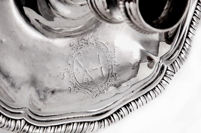 Lot 103 - A George II sterling silver chamberstick, London 1759 by William Cafe (reg. 16th Aug 1757)