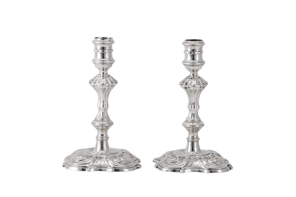 Lot 116 - A pair of George II sterling silver candlesticks, London 1742 by William Gould (this mark reg. 15 June 1739, Grimwade: 3150)