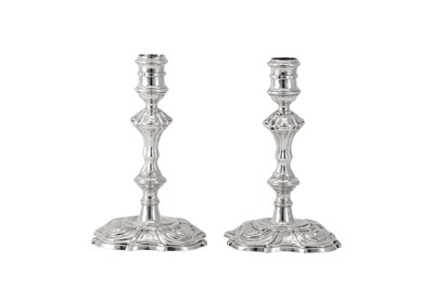 Lot 116 - A pair of George II sterling silver candlesticks, London 1742 by William Gould (this mark reg. 15 June 1739, Grimwade: 3150)