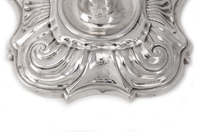 Lot 116 - A pair of George II sterling silver candlesticks, London 1742 by William Gould (this mark reg. 15 June 1739, Grimwade: 3150)
