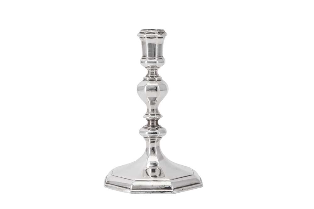 Lot 5 - A Queen Anne Britannia standard silver candlestick, London 1709 by Thomas Merry I (reg. 19th June 1701)