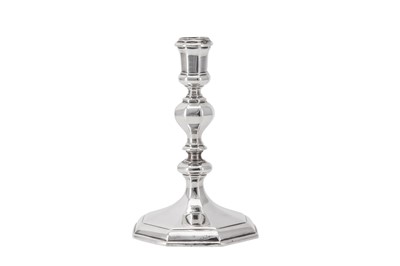 Lot 5 - A Queen Anne Britannia standard silver candlestick, London 1709 by Thomas Merry I (reg. 19th June 1701)