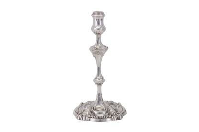 Lot 109 - An early George III sterling silver cast candlestick, London 1763 by Thomas Heming (reg. 12th June 1745)