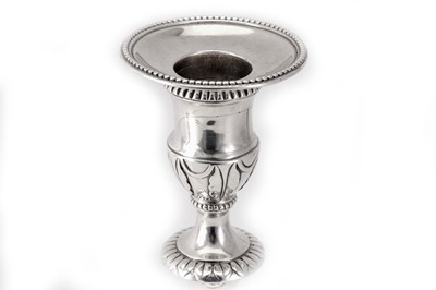 Lot 118 - A pair of George III sterling silver candlesticks, London 1777 by Robert Makepeace and Richard Carter (reg. 20th January 1777)