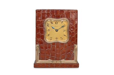 Lot 48 - A CROCODILE SKIN AND 9CT GOLD DESK CLOCK...