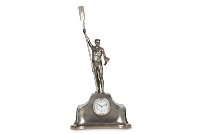 Lot 52 - A 1930'S SILVERED METAL MANTEL CLOCK DEPICTING...