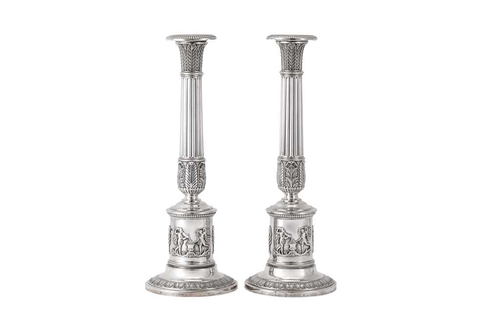 Lot 73 - A pair of early 19th century German 13 loth (812 standard) silver candlesticks, Frankfurt circa 1820 by Johann Jacob Lücke