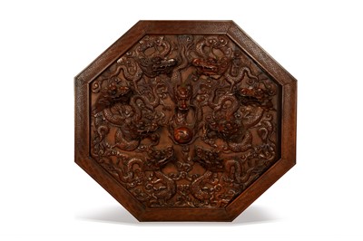 Lot 176 - A CHINESE OCTAGONAL HONGMU 'NINE DRAGONS'...