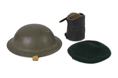 Lot 211 - A WW2 style Brodie helmet, which seems to have...