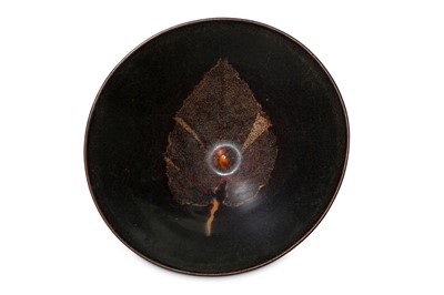 Lot 193 - A CHINESE LEAF PRINT JIZHOU BOWL. The conical...