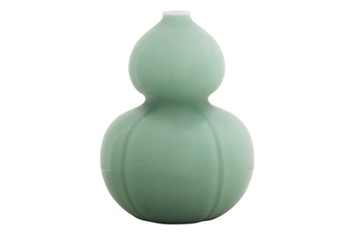 Lot 526 - A CHINESE CELADON-GLAZED DOUBLE GOURD VASE....