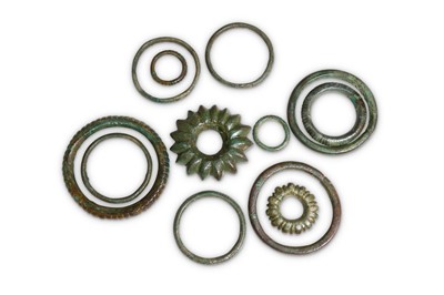 Lot 57 - A GROUP OF BRONZE AGE RINGS Circa 1st...