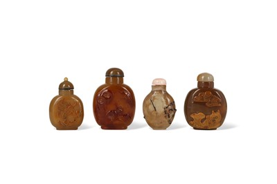 Lot 464 - FOUR CHINESE AGATE SNUFF BOTTLES. Qing Dynasty....