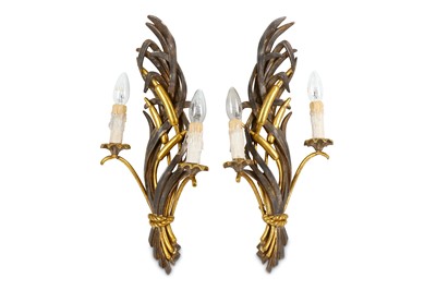 Lot 1016 - A pair of early 20th Century carved and parcel...