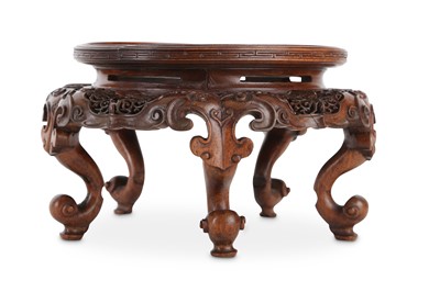 Lot 370 - A CHINESE HONGMU 'DRAGON' STAND.