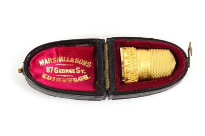 Lot 141 - A cased Victorian 15 carat gold thimble,...