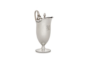Lot 44 - A George III sterling silver lidded jug,...